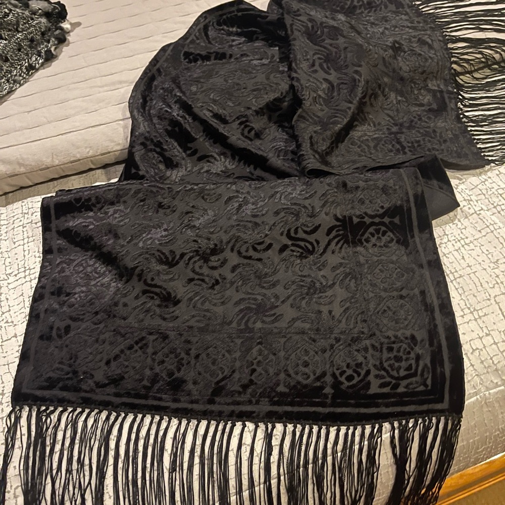 Velvety, satin-y textured scarf with fringe. Approx 7’ x 1’.